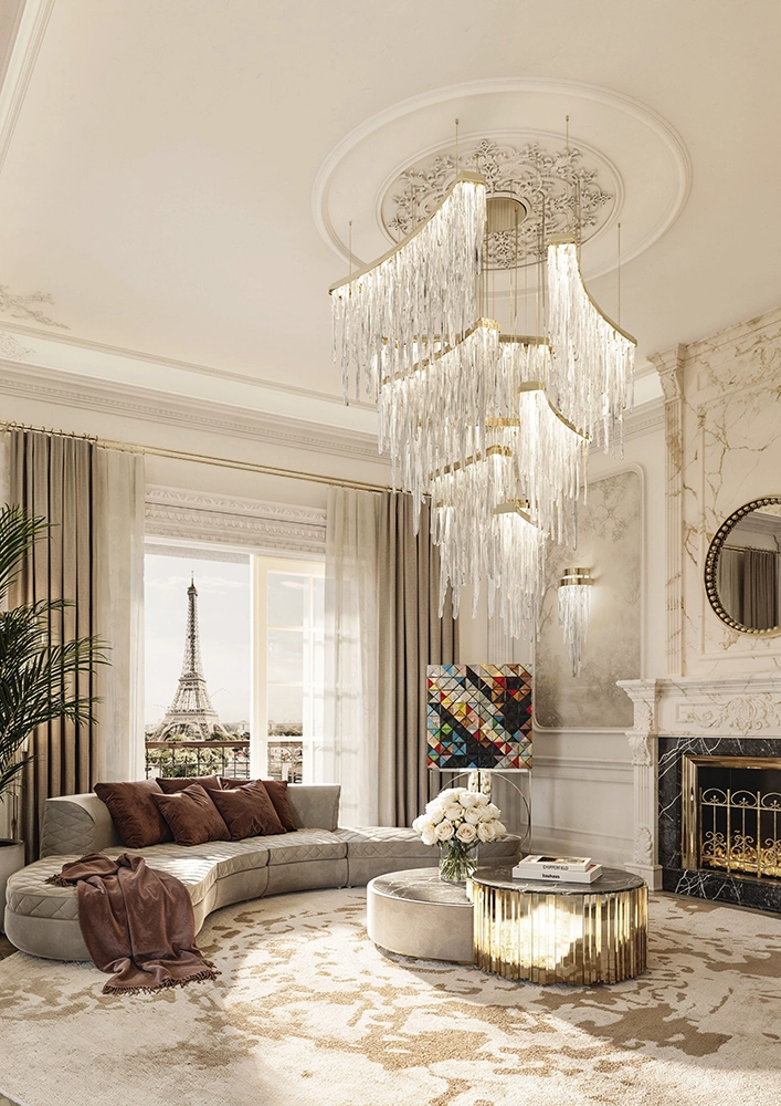 Ornate moldings, sculptural lighting, and a softly curved seating arrangement reinterpret Parisian formality for contemporary living.