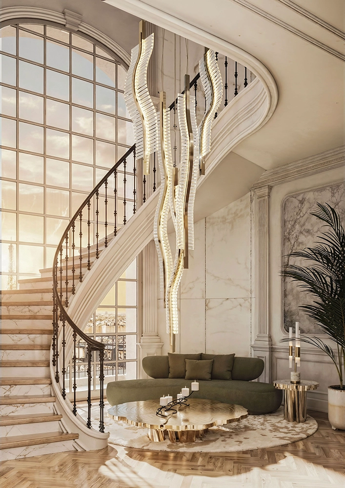 Seen in daylight, the Liwave chandelier follows the curve of the staircase while bringing movement and luminosity to the interior.