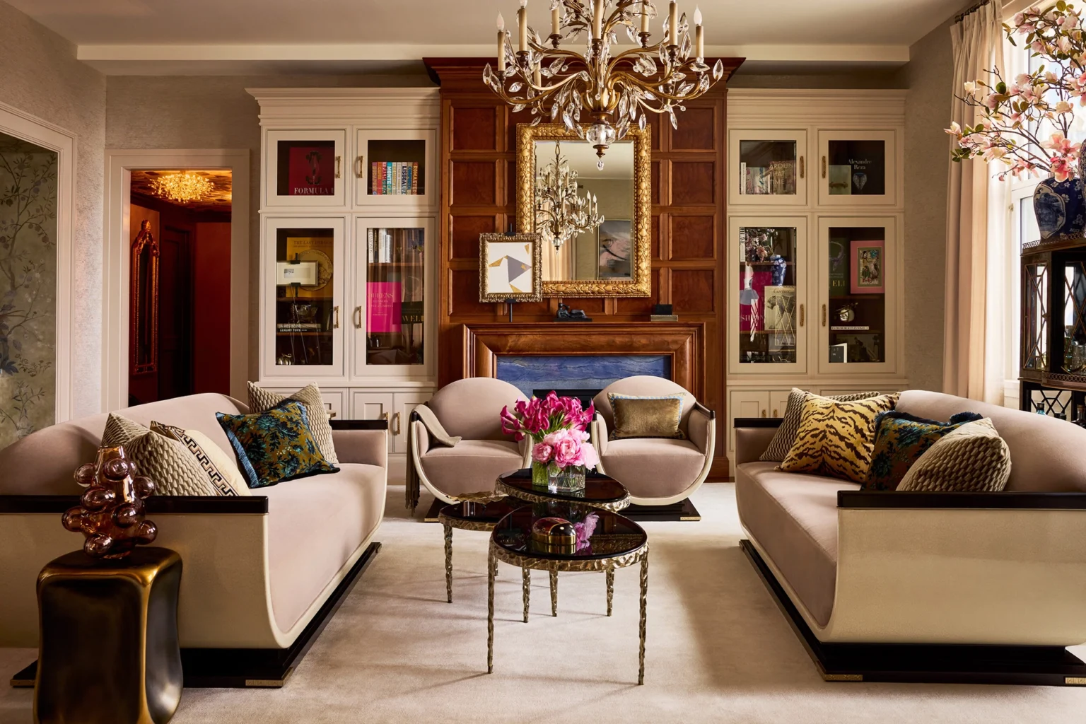 Olivia Palermo’s Manhattan apartment brings together classical references, tailored upholstery, crystal lighting, and richly layered decorative details. Photography by David Land.